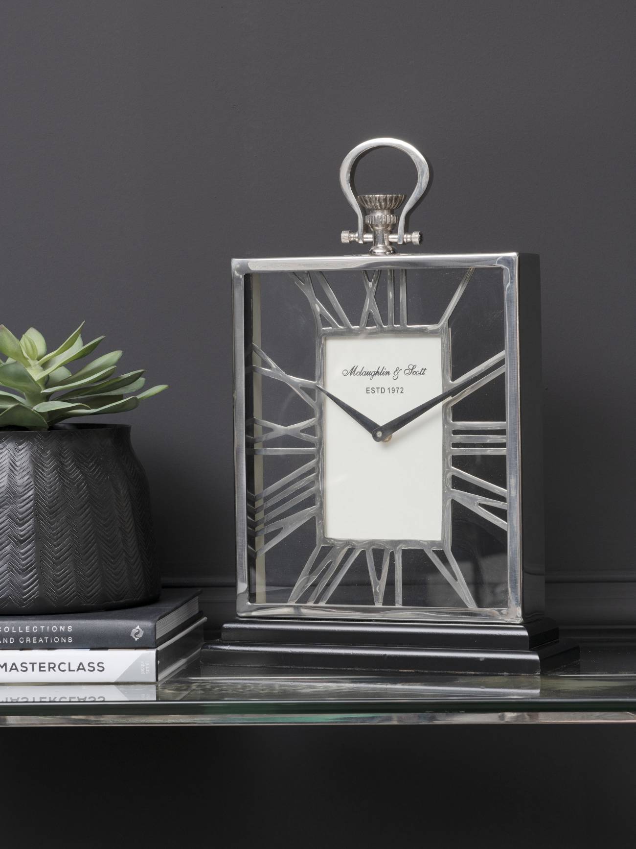 Silver And Black Skeletal Mantel Clock